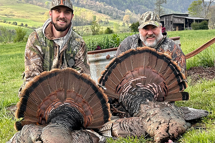 Hunters with their prize.